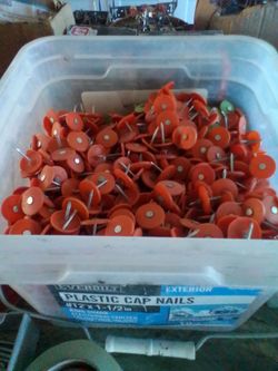 Plastic cap nails for roofing