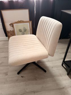 Cream Channel-Tufted Armless Swivel Chair