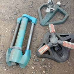 Various Sprinklers And Hose Adapters