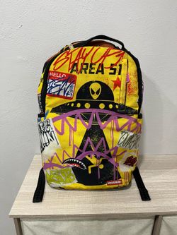 Sprayground Area 51 Alien Trashed Sign Backpack Yellow Graffiti Shark Mouth
