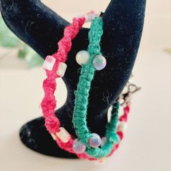 Set of 2 8" Red & Green Hemp Handmade Macrame Anklets Bracelets with Multi-Colored Beads and Clasp Closures. A Cat Charm dangles from the Red Bracelet