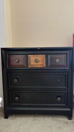 Black 3-drawer dresser with a classic/vintage-style design. Good size for bedroom storage.