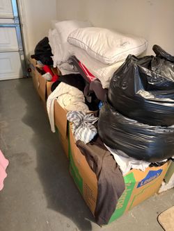Boxes filled with clothes and other things