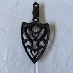 Vintage Black Cast Iron Trivet with a Double Heart and Scrolls Pattern 