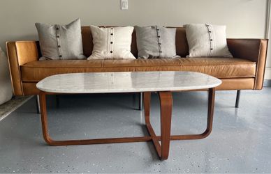 Mid-century Leather sofa with decorative pillows