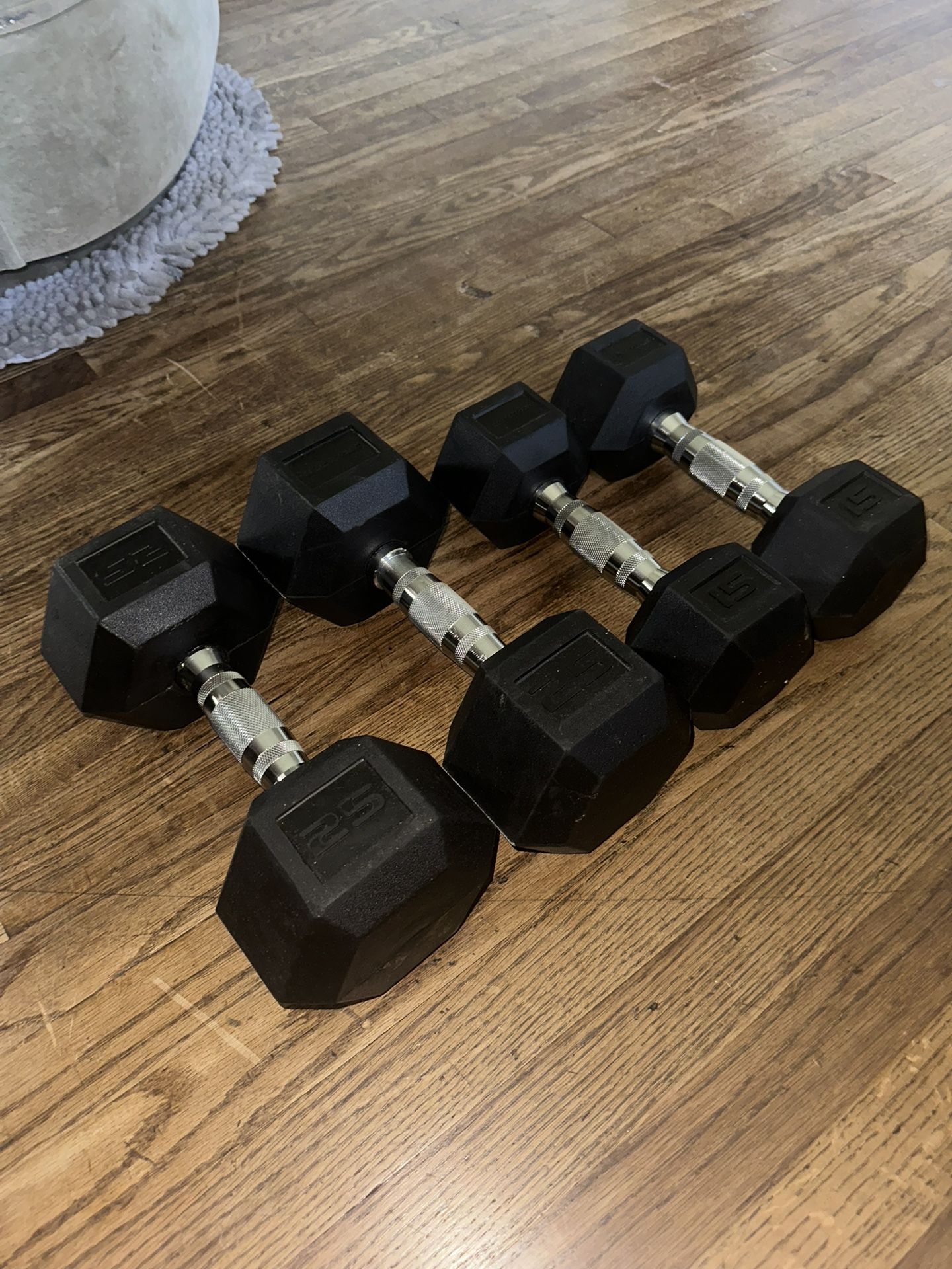 25 And 15 Pair Of Dumbbells 