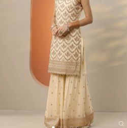 cream and gold embroidered suit