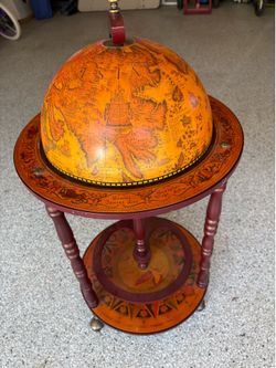 Vintage old world globe bar cart