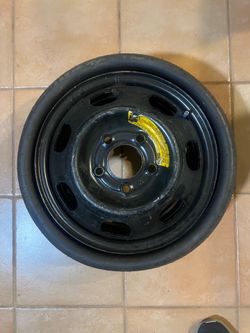 Spare tire space saver