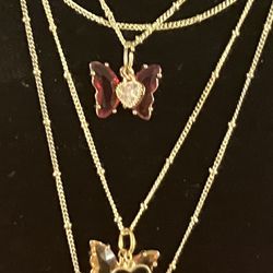 Beautiful gold plate butterfly crystal charms on an 18 karat gold plate 30 inch chain