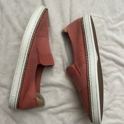 UGG women's slip on sneaker, peach/tangerine color with white soles, size 7.5