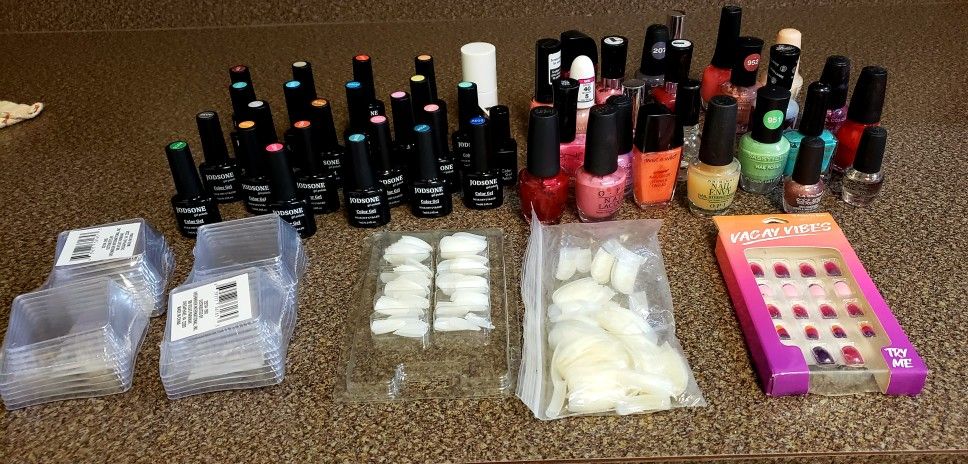 Nail Supplies 25 Gel Polishes 25 Regular Polishes & Multiple Styles of Nail Tips $25 for All