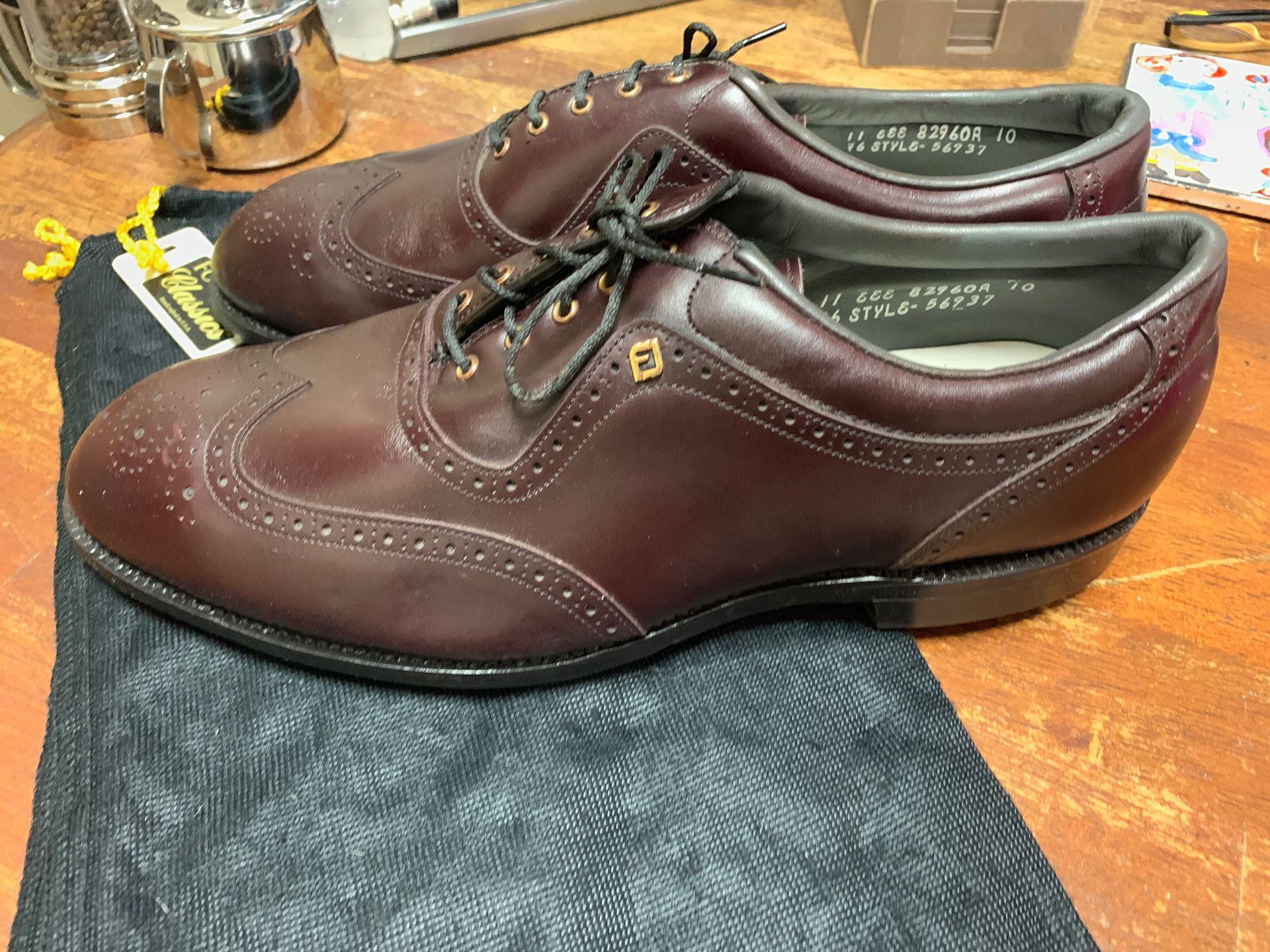 Foot joy golf. Shoes. Size 11 E. Made in USA. They are extremely nice. Golf