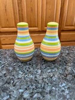 Vintage Ceramic Blue , Yellow green and orange striped Pair of Salt and Pepper Shakers.   Size approximately 3 1/2 inches tall.  Preowned.  Has been o