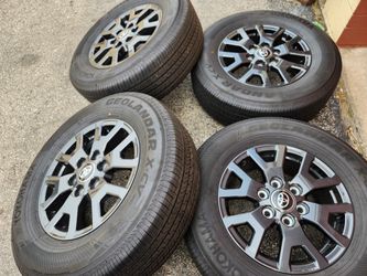 17" Toyota Tacoma 4runner factory charcoal wheels and tires  new