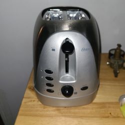 New Oster Stainless Toaster/ 8H45