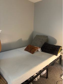 A Brand New King Size Bed with a Brand New King Size Foam Memory Mattress are for Sale