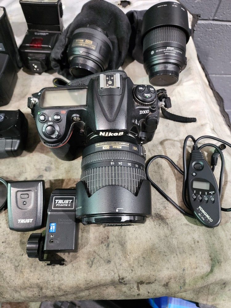 Nikon D300 W/ Backpack, Lenses And Other Accesories
