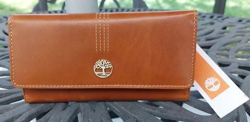 Brand New with tags Timberland cognac genuine 100 % leather wallet with RFID protection.
