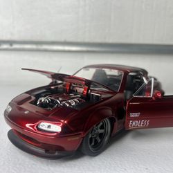 1990 Mazda Miata diecast model car red