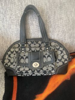 Black damaged Coach purse