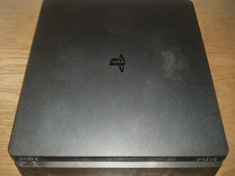 PS4 Slim CUH-2215B — sold as-is.