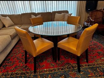 Used twice, table and 4 chairs, great quality