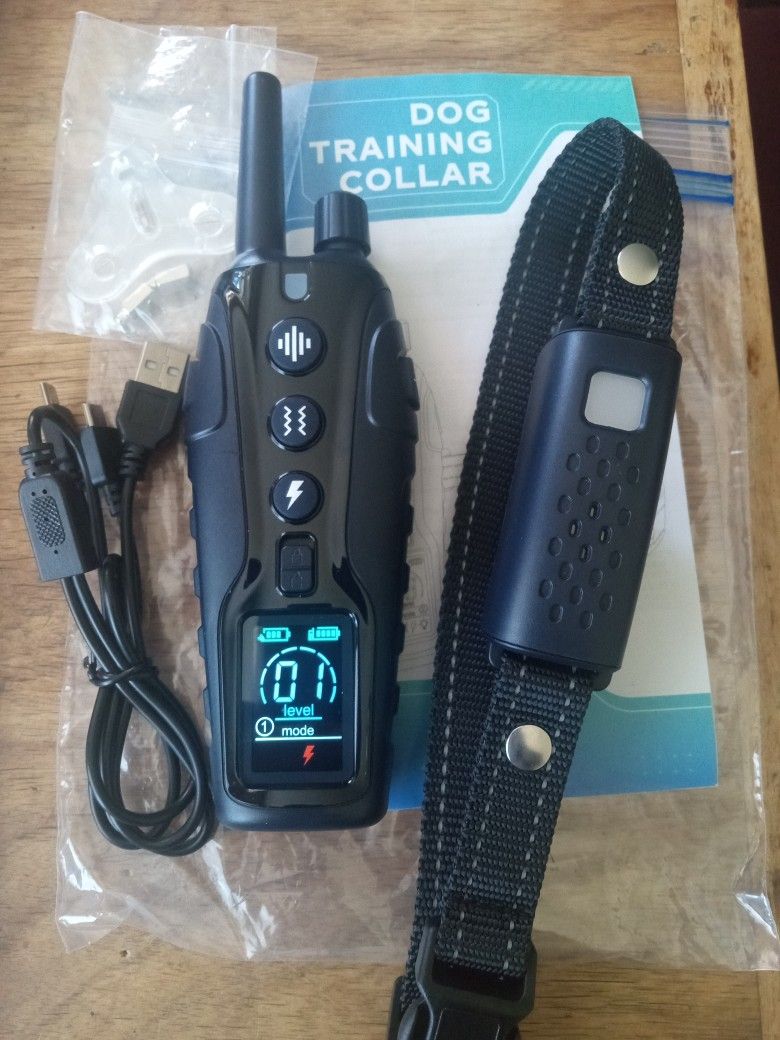 TRAINING COLLAR DOG 4 TRAINING MODES SHOCK, VIBRATION, BEEP, COLLAR FLASHING LIGHT, AND KEYPAD LOCK 4000FT RANGE WATERPROOF COLLAR 
