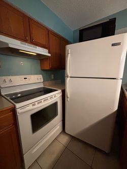 Frigidaire Stove Oven and Refrigerator Set Plus Range Hood