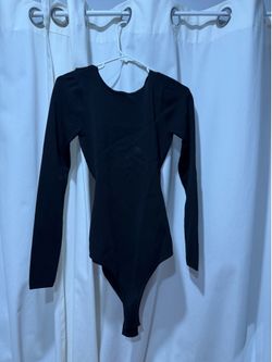 Black long sleeve bodysuit with open back design size small