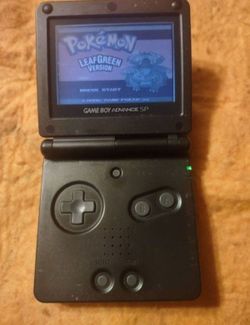 Rare, true collectible Game Boy advance sp with original pokemon leaf green all tested and works amazing will not separate