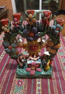 Mexican hand painted clay candlelabra.