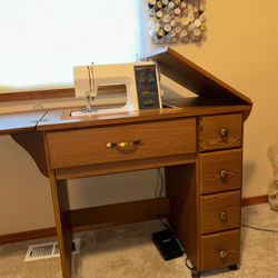 Vintage Kenmore sewing machine with cabinet