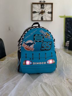 LOUNGEFLY DISNEY/PIXAR LIGHNING MCQUEEN DINOCO BLUE LIGHT-UP MINI BACKPACK