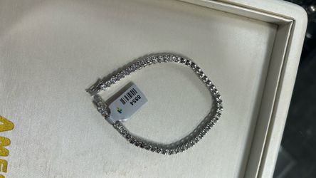 Silver tennis bracelet with czs