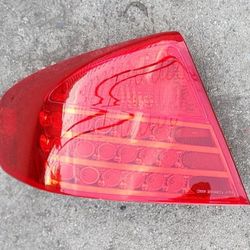 2003 2004 INFINITY G35 LEFT DRIVER TAIL LAMP