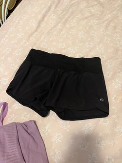 Size 4 Lulu lemon shorts (like new) plus 3 free like new SHEIN shirts