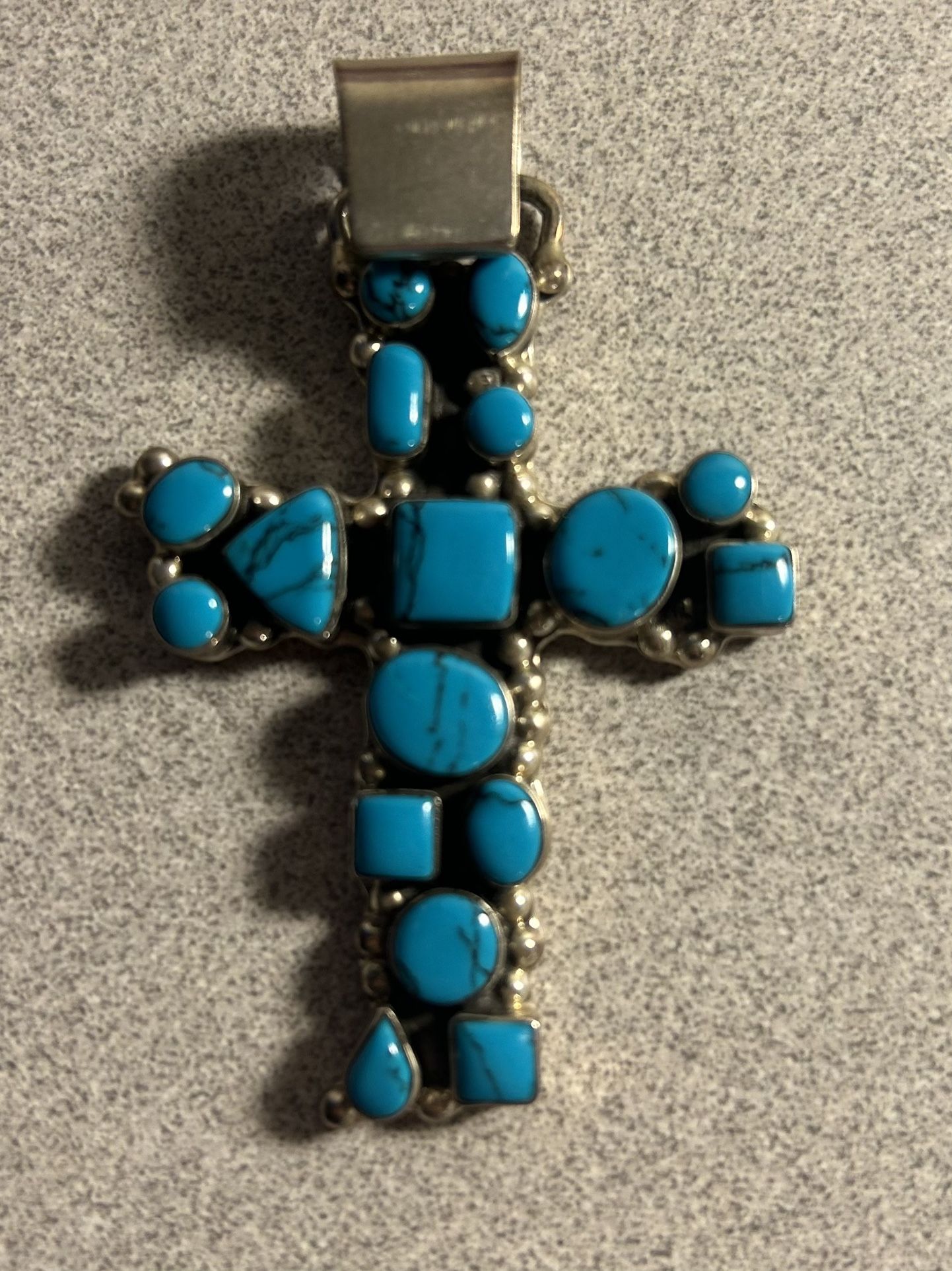 Great Turquoise Crossed Silver Pendant