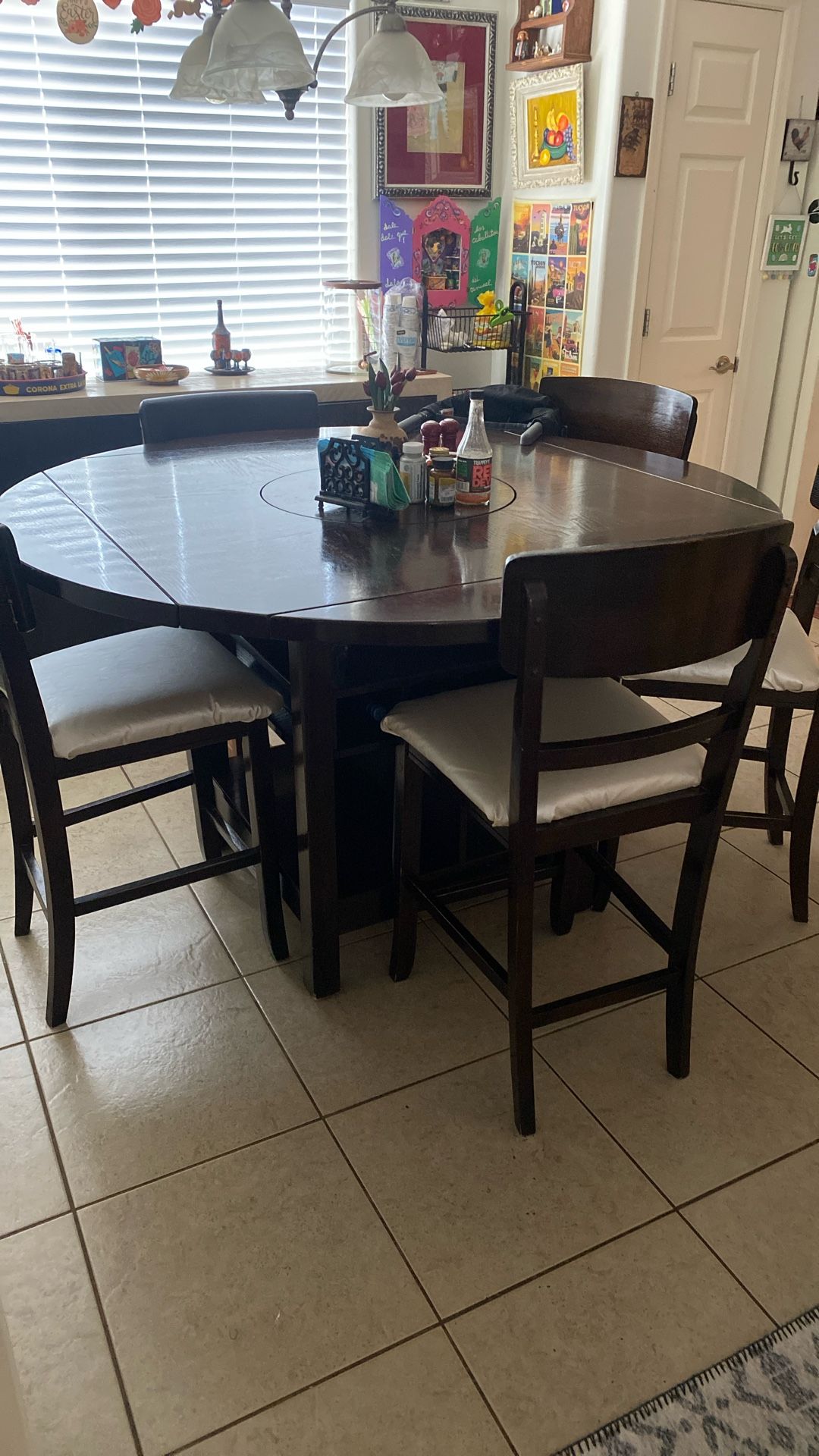 Six chairs a lazy Suzy and a wine holder