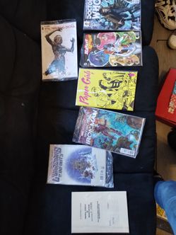 Box full of comic books and other stuff from GEEKFUEL