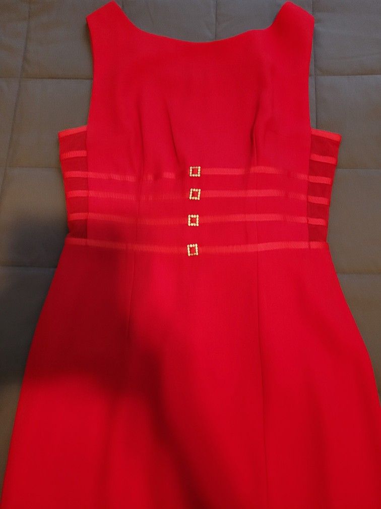 Long red dress Rhine stone botton.