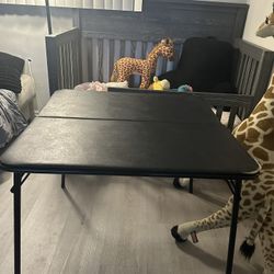 black kids table and 4 chairs 