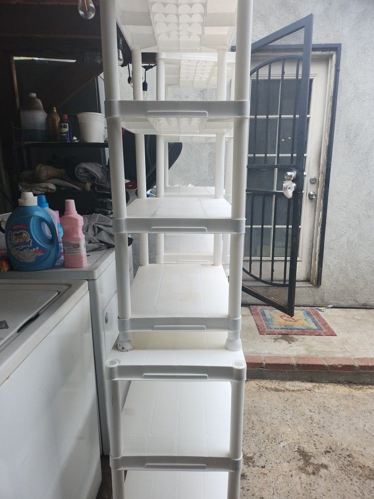 white plastic shelving unit 36inch high x 22 inch wide for Sale in Los