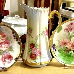 antique hand painted pitcher and two floral plates