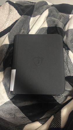 Pokemon cards and top loader binder