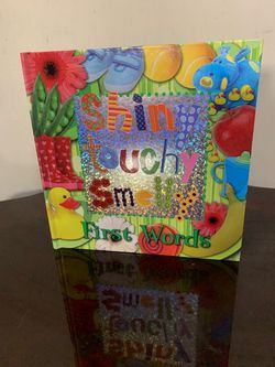Shiny Touchy Smelly First Words Book by Sarah Phillips