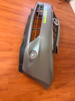 Front Bumper Cover and Grilles for Nissan Versa 2014, 2015, 2016 OEM.