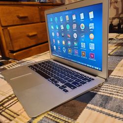 Excellent 11 Inch Apple Macbook Air Laptop Computer With Intel Core i5 Processor With Programs 