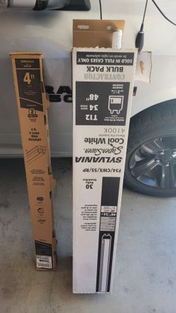 New 4 foot fluorescent light fixture with xtra bulbs
