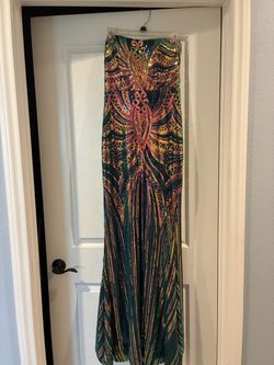 Woman’s colorful long evening gown